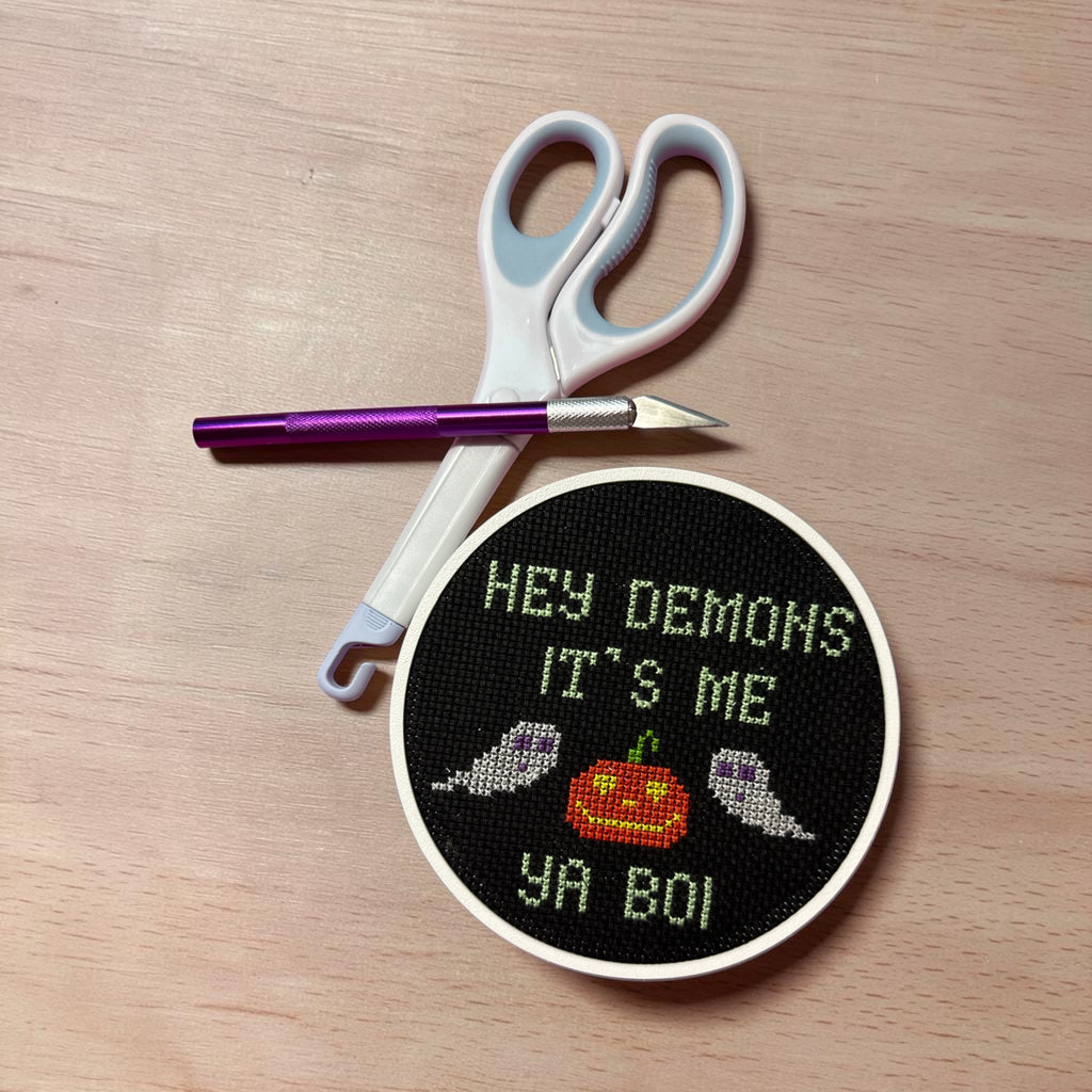 Demons finished cross stitch